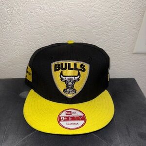 New Era Black and Yellow Bulls Snapback Hat